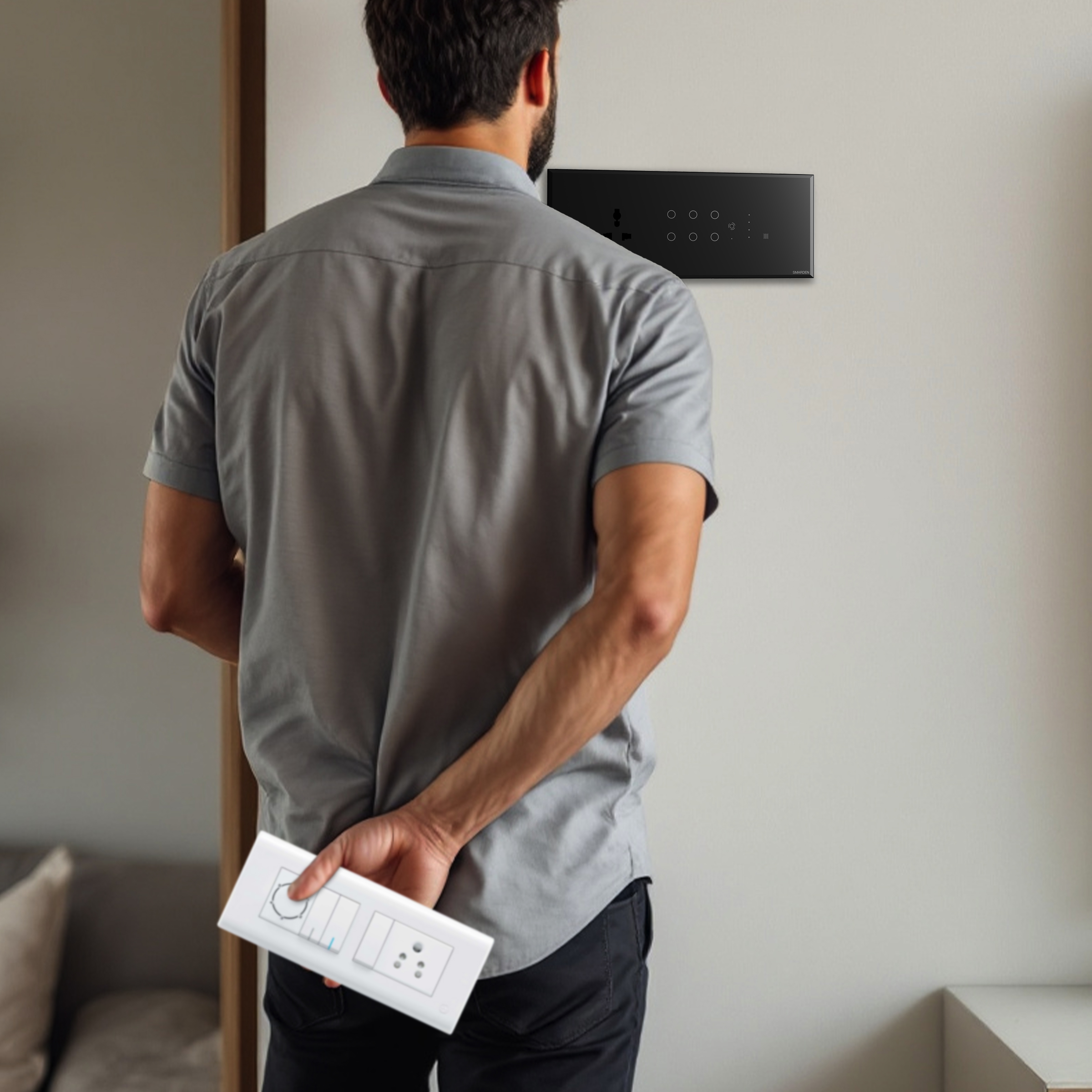 Man installing SmarDen smart touch switch panel on wall for modern home automation