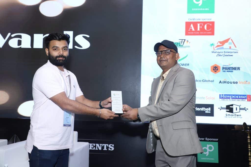 SmarDen CEO Mr. Shrey Sharma receiving the Best Retrofit Smart Home Company award in India